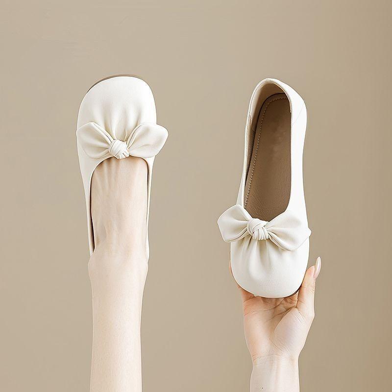 Bow flat-soled single shoes women's spring and autumn new shallow mouth round head soft leather comfortable versatile shoes