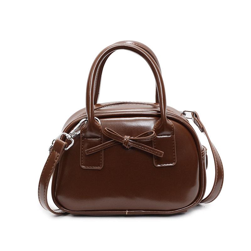 Hot Sale Premium Textured Oil Wax Leather Hand Carry Bowling Bag Niche Fashion Bow Versatile Messenger Women's Bag