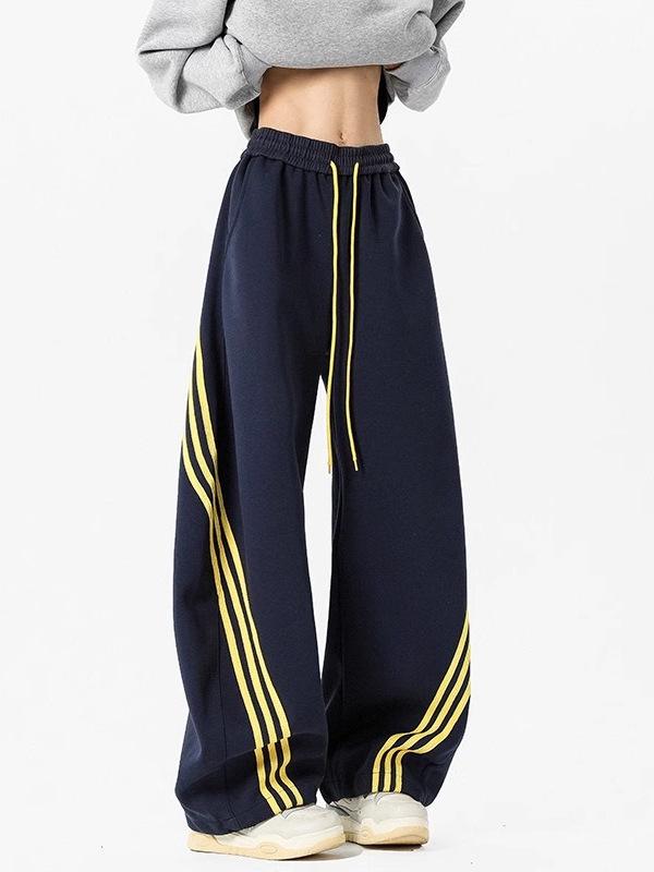 Pánské tmavě modré široké tepláky se třemi pruhy - Ležérní jarní high street trend