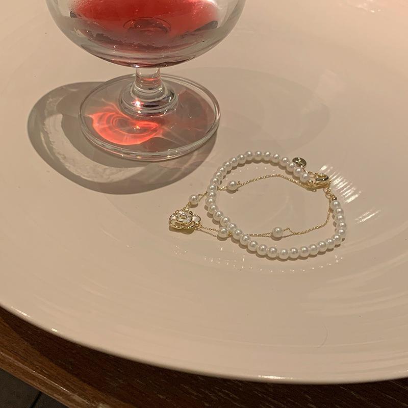 Double-layer pearl camellia bracelet light luxury high-end bracelet elegant and versatile temperament fashion niche jewelry wholesale