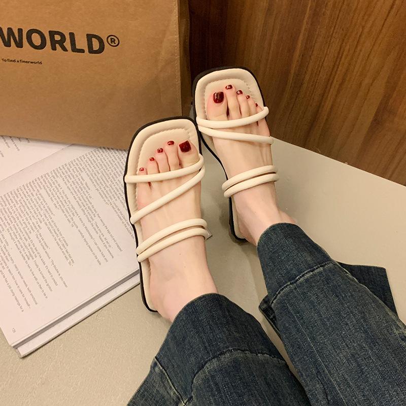 

French flat-soled sandals for women to wear in the summer of 2025, the new flat-soled one-word with fairy wind beach cool slippers for women 35