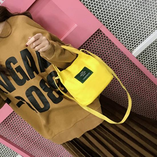 Einfarbige, lässige Damen-Segeltuch-Umhängetasche im Freien