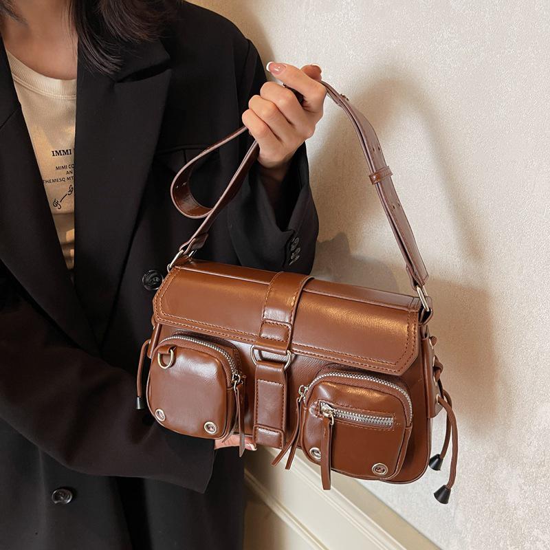 

Трендовая текстура Сумка-багет под мышкой для горячей девушки - Женская нишевая дизайнерская мотоциклетная сумка на плечо и через плечо 2025 кофейный