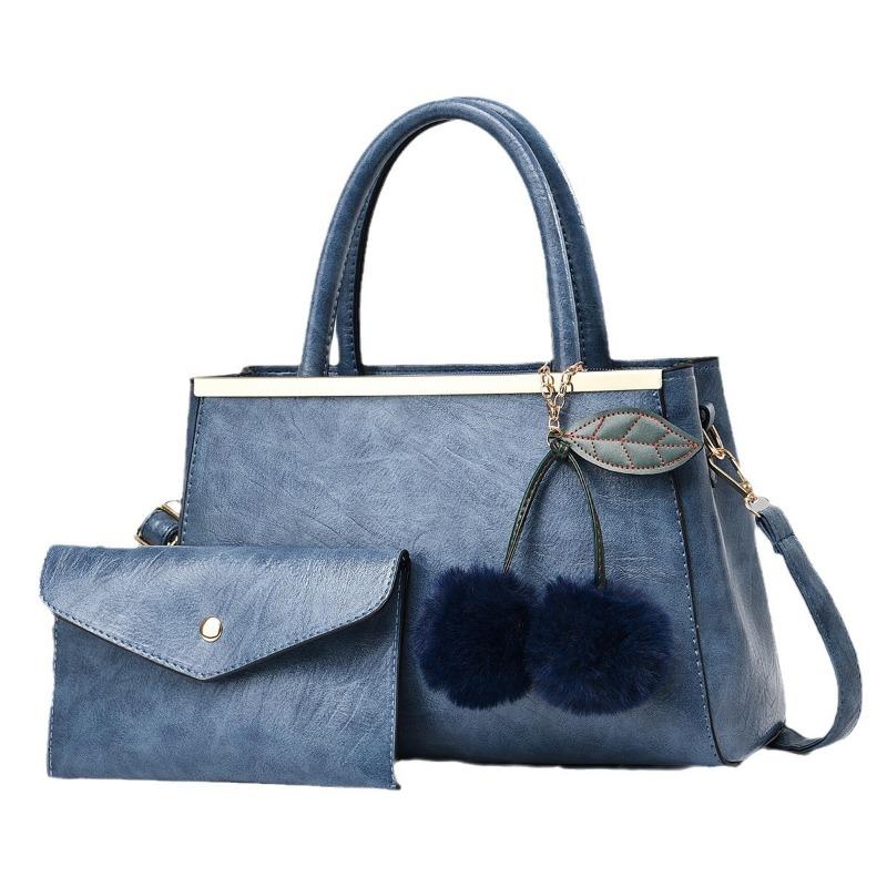 Einfache Elegante Damenhandtasche und Geldbörsen Neue Große Kapazität Fellbommel Anhänger Schultertasche High End Damen Umhängetaschen