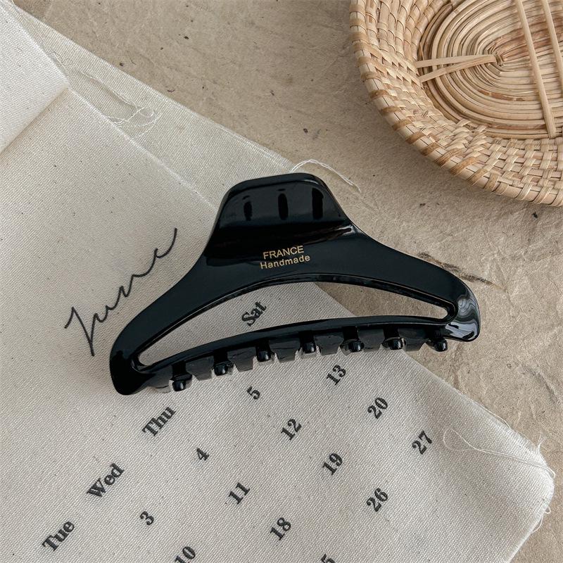 Gold-Labeled Acetate Dumpling Claw Clip Hair Accessory