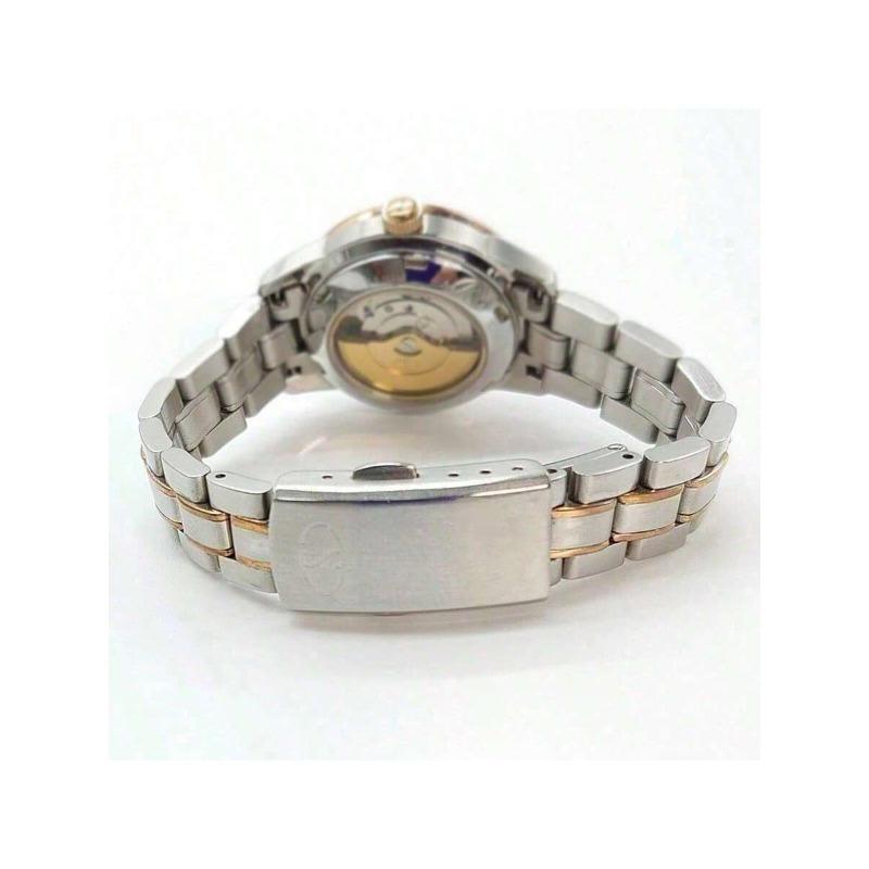 Oriental Automatic Mechanical Watch from featuring dial, mother-of-pearl dial Oriental mother-of-pearl numeral markers/stainless steel GOLD-TONE