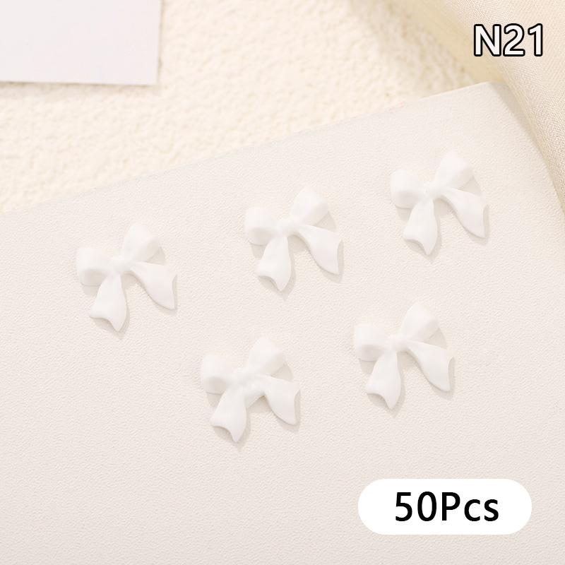 

50Pcs Ribbon Resin Bow Nail Charm Parts 3D Nail Art Decoration Accessories Supplies For Diy Korean Manicure Design as the picture