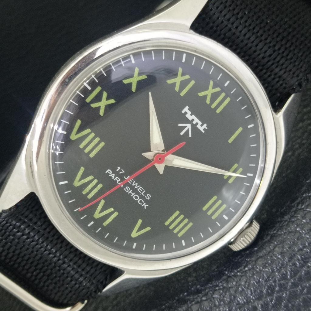 

INDIAN VINTAGE HMT HAND-WINDING MENS ROMAN FIGURE BLACK DIAL WATCH a702850-1 R211-a702850