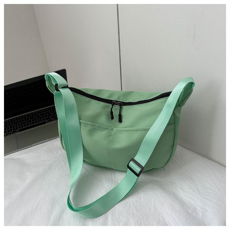 Spring new fashionable versatile solid color messenger bag casual simple dumpling bag street trend large capacity schoolbag
