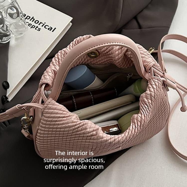 Bolsa de ombro feminina elegante com textura