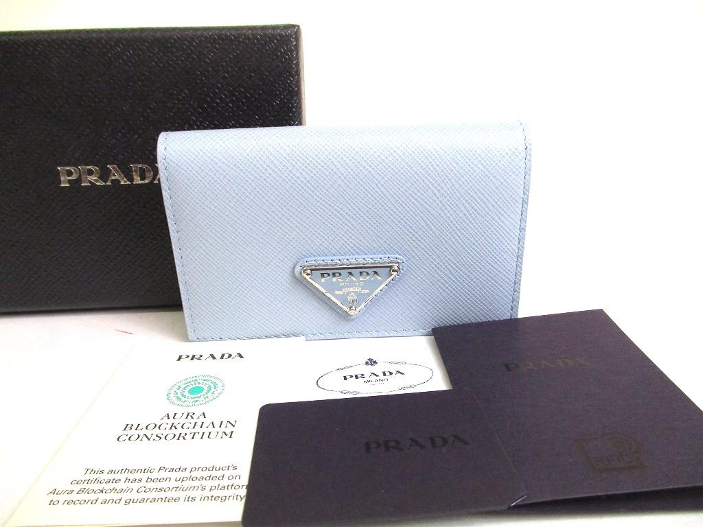 

Оригінальний PRADA Світло-блакитний картхолдер з саф янової шкіри #a834 Відновлений