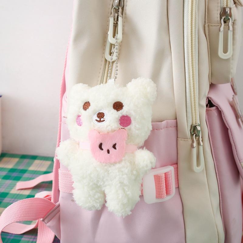 Small, fresh and large-capacity junior high school schoolbag women's casual and durable backpack three-piece schoolbag