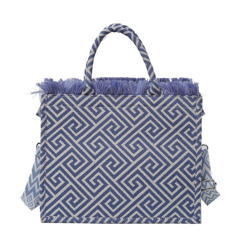 

Niche Design Tassel Embroidery Tote Bag 2024 New Swing-pattern Shoulder Diagonal Handbag синій