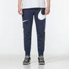 Nike Pánské pletené joggery se stahovací šňůrkou s velkým logem Swoosh Modré DD6092-437