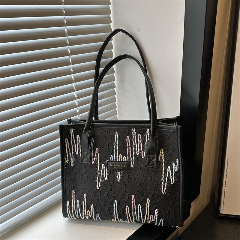 Stylish portable shoulder bag, commuting beautiful large-capacity canvas bag, simple 2025 new women's bag, foreign style tote bag