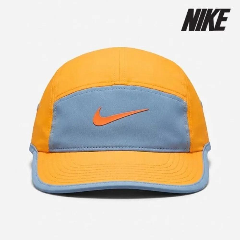 Cap /g4- FB5624-717 / Fly-Dri-Fit Unstructured Swoosh Cap 58