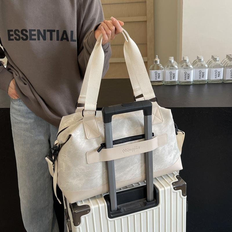 Travel bag Large capacity high-end messenger bag Fitness business trip casual fashion simple shoulder tote bag Duffel bag