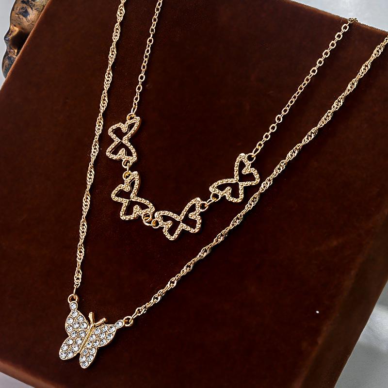 

Elegant Double-Layer Butterfly Pendant Necklace with Diamond Accents золотой