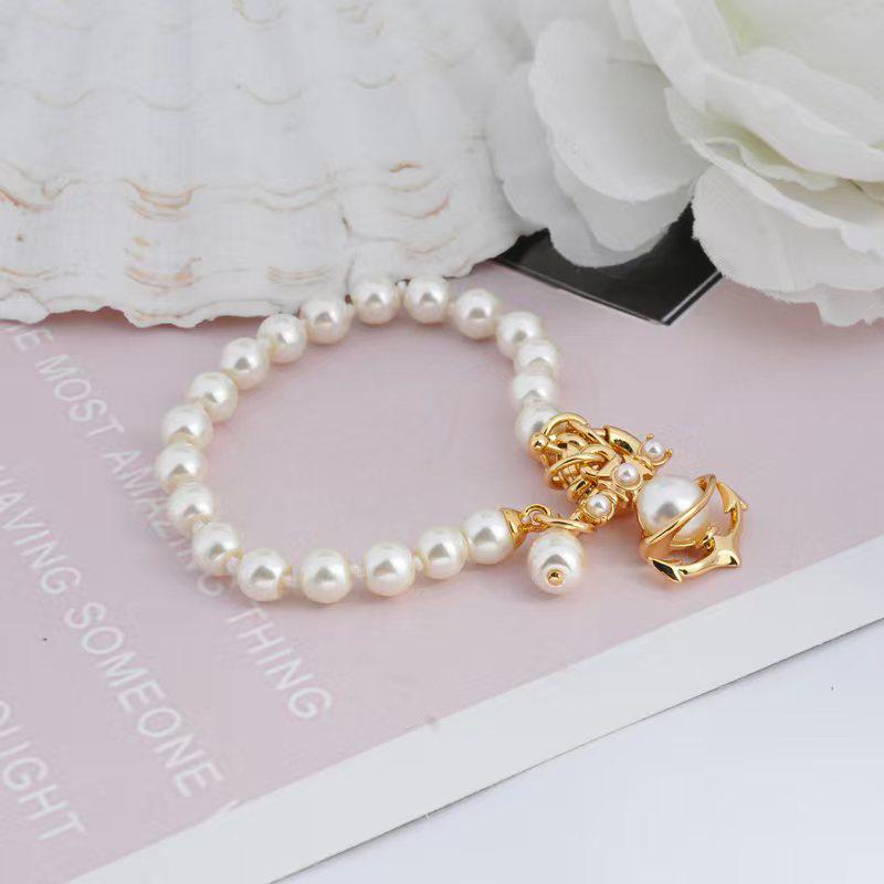 Empress Dowager Saturn Pearl Necklace, Bracelet, and Earrings Set: Light Luxury Punk Clavicle Chain for Women