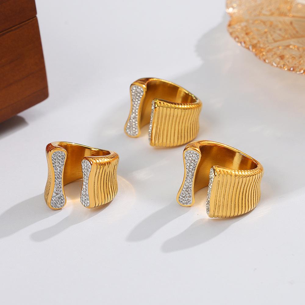 

Geometric Multi-Layer Bone-Shaped Titanium Steel Ring with Inlaid Diamonds Size 8