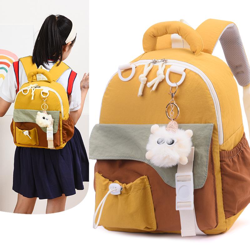 Large Capacity Cute Pendant Schoolbag - Versatile Casual Backpack for Students 2025 Autumn/Winter Collection