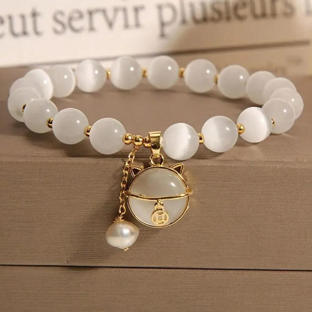 

Exquisite Natural Stone Bracelet Elegant Lily of The Valley Flower Pendant Elastic Beaded Bracelets for Women Party Zircon Gift