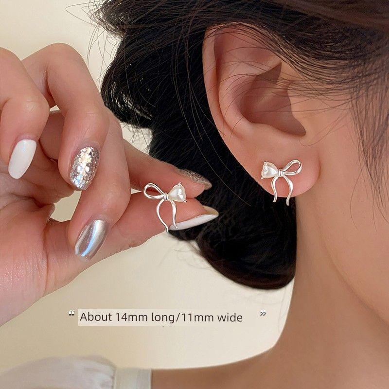 

[Xiangnan] 925 Sterling Silver Bow Pearl Stud Earrings Accessible Luxury Fancy 2025 New Hot-Selling Earrings Female Earrings 925 silver Bows pearl earrings (two price)