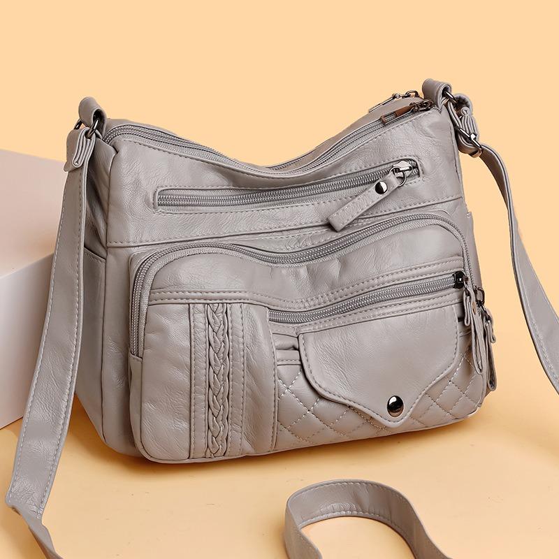 Fashion retro trend four seasons soft leather multi-compartment multi-pocket sewing line multi-layer single shoulder oblique span women's bag