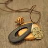 Damen Vintage Hohlschnitzerei Waterdrop Holz Samt Seil Pullover Halskette Schmuck