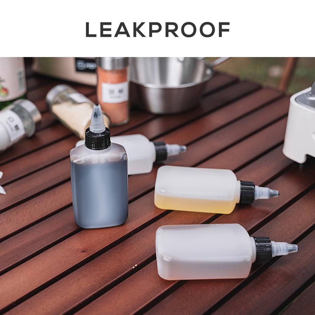 4 Pack Outdoor Condiment Bottles Oil Bottles Seasoning Fuel Oil Containers Dispensers for Camping BBQ Picnic Travel