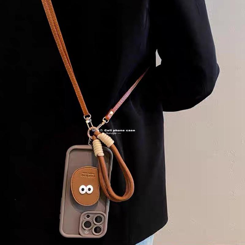 Eye-Shaped Airbag Bracket Phone Case with Crossbody Lanyard for iPhone 14, 15, 16 Pro Max.