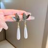 Fashion Geometric Bow Flower Pearl Earrings Women'S Premium Versatile Small Fragrant Wind Earrings