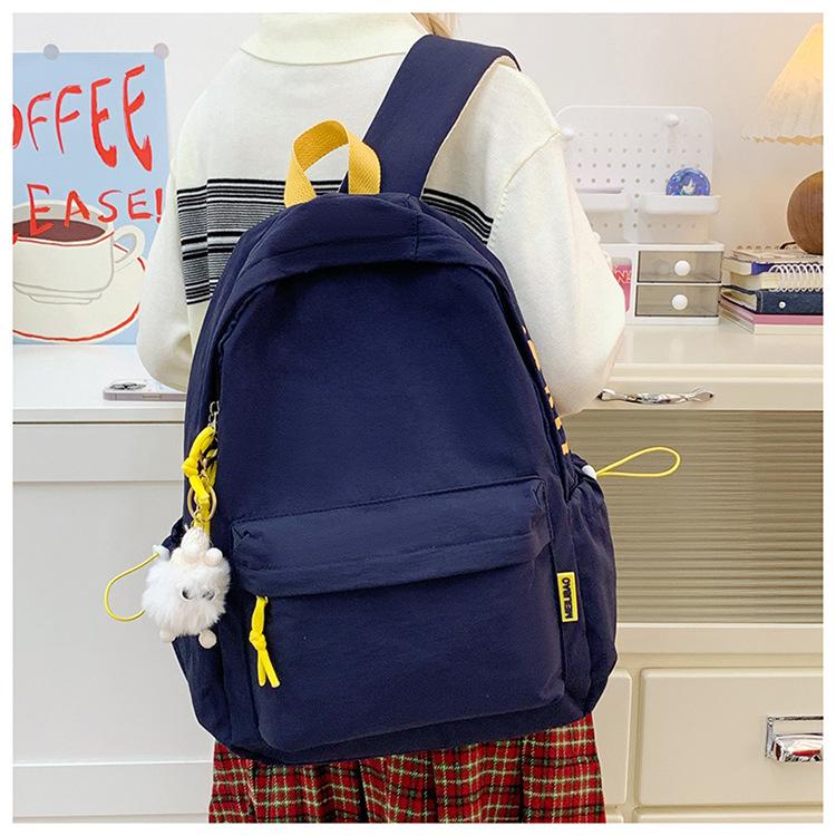 Schoolbag College Student School Bag Male and Female Junior High School High School Elementary School Student Backpack 1011 New Leisure Travel