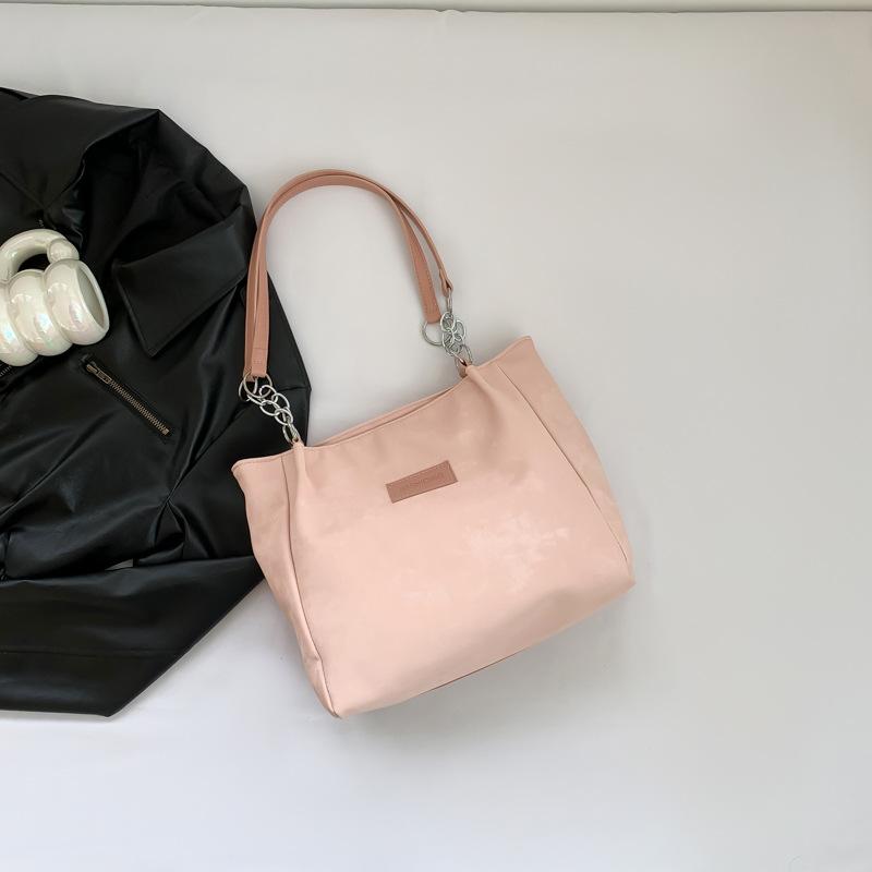 

Женская сумка-тоут из мягкой кожи большой вместимости на плечо, новая весна 2025, универсальная сумка-подмышка в стиле инс, рабочая сумка-тоут розовый