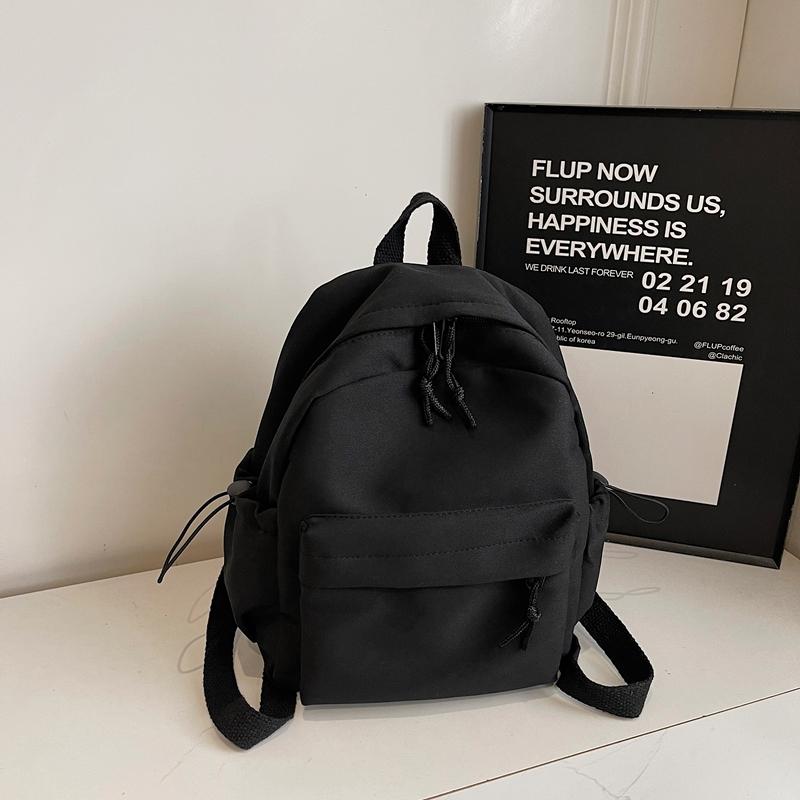 Minimalist Backpack for Women and Men Lightweight Nylon School Bag with Front Pocket