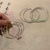 Multi-ring Bell Pendant Bracelet - Simple, Cool, Trendy, Unique, Versatile, Elegant and High-end Accessory.