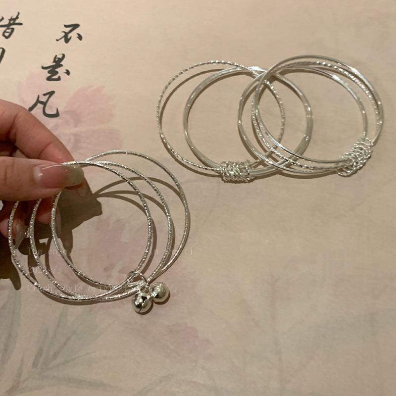 Multi-ring Bell Pendant Bracelet - Simple, Cool, Trendy, Unique, Versatile, Elegant and High-end Accessory.