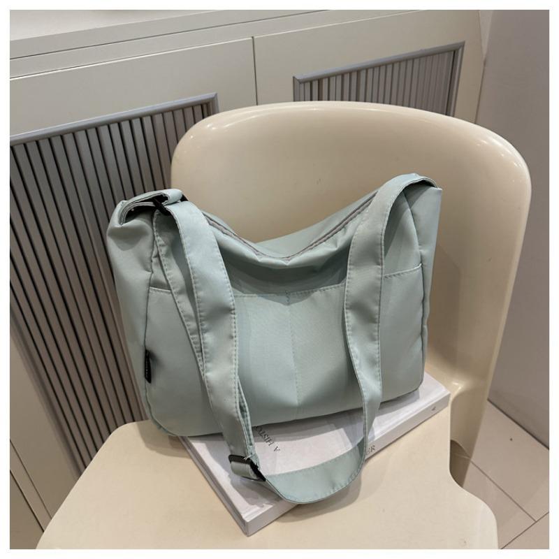 New casual messenger canvas bag, simple large-capacity shoulder bag, niche design sense, daily commuter bag