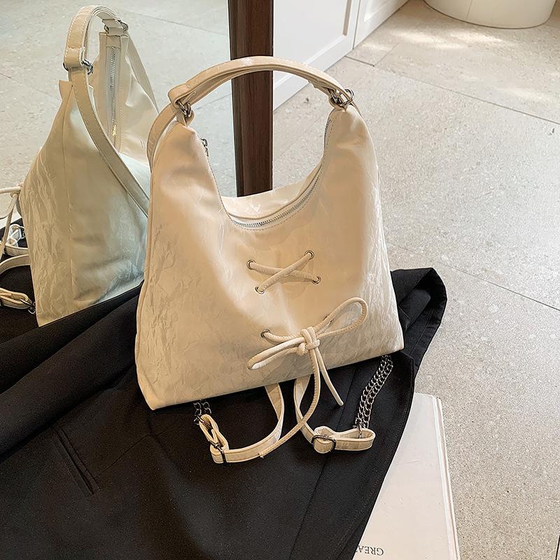 

Niche gentle fashion texture bow shoulder bag women 2024 summer new personalized double shoulder tote bag women білий