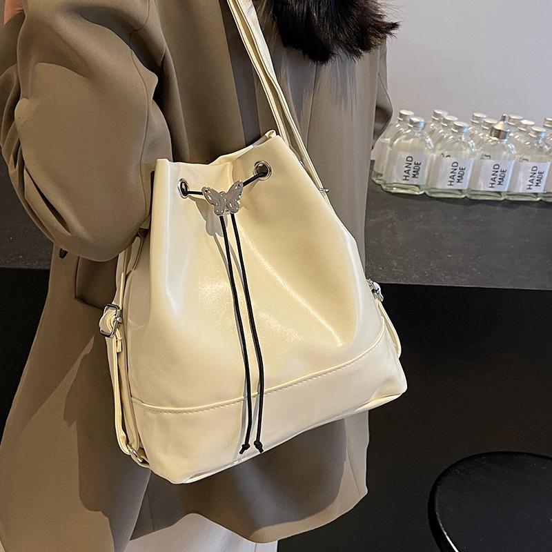 

Рюкзак-рюкзак преміум-класу з текстурою, новий жіночий рюкзак у стилі коледжу 2024 року, проста сумка-відро через плече