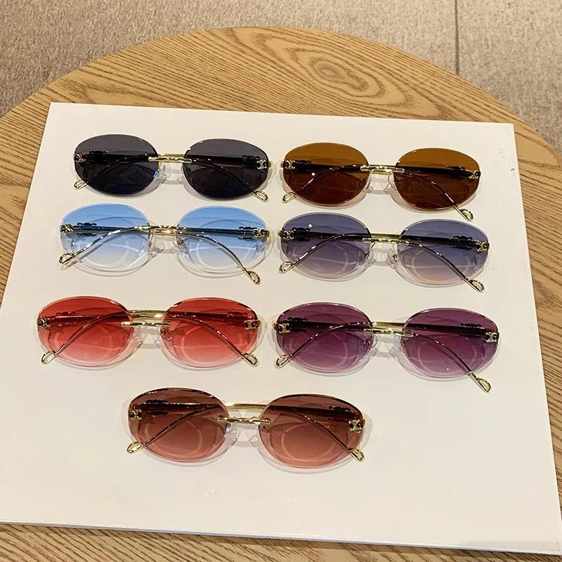 New Oval Metal Frameless Sunglasses Men'S And Women'S High-End Retro Fashion Sunscreen Glasses Uv400 Shades Eyewear