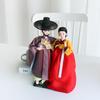 A Pair of Traditional Korean Dolls Wearing Hanbok and Gat