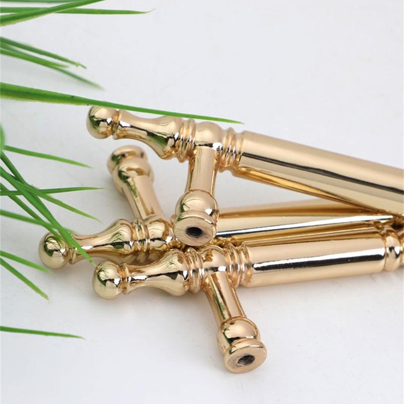 Skříňkové úchytky se zlatou povrchovou úpravou Ergonomický design Hardware odolný proti korozi Jednoduchá instalace Pro kuchyňské skříňky Komody