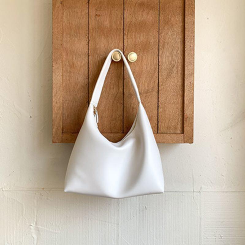 ins simple and versatile milk tea color bag gentle wind Korean portable soft leather dumpling bag retro shoulder armpit bag