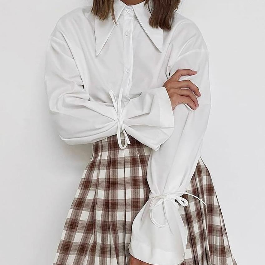 Spring French pure white pointed neck temperament bow commuter shirt 1116 European and American fashion wholesale top women
