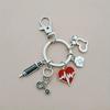 Vintage Syringe Stethoscope Keychain with Heart-Shaped Pendant