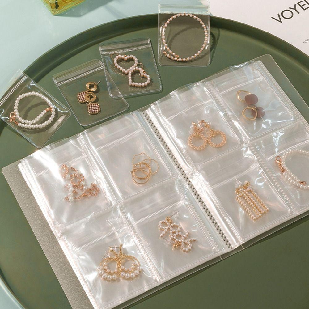 Tragbare Schmuckaufbewahrungsalben Oxidationsschutz Staubdichtes Album Halskette Armband Ring Buchhalter