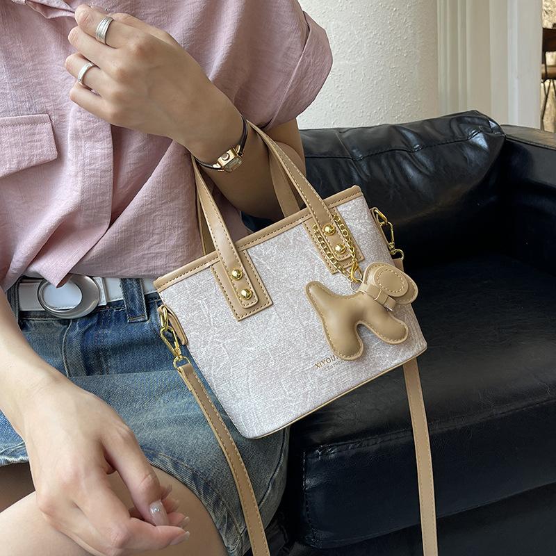Simple Handbag Bag Women's High-end Sense Versatile Single Shoulder Oblique Span Bag Niche Design Commuter Bucket Bag
