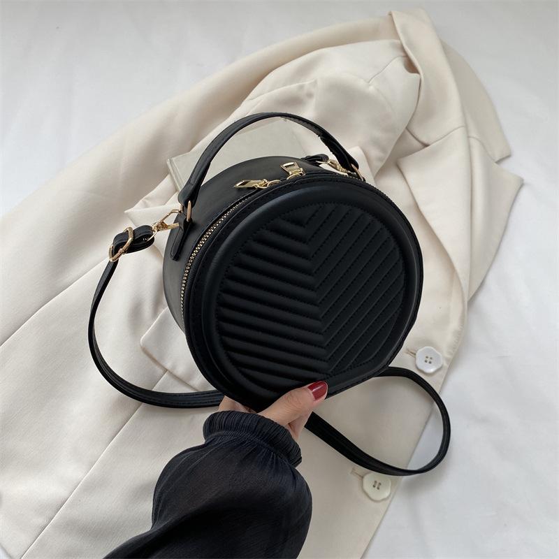 Einfache einfarbige kleine Tasche Damen 2025 Herbst und Winter neue Schulter-Umhängetasche Textur kleine runde Tasche Tide