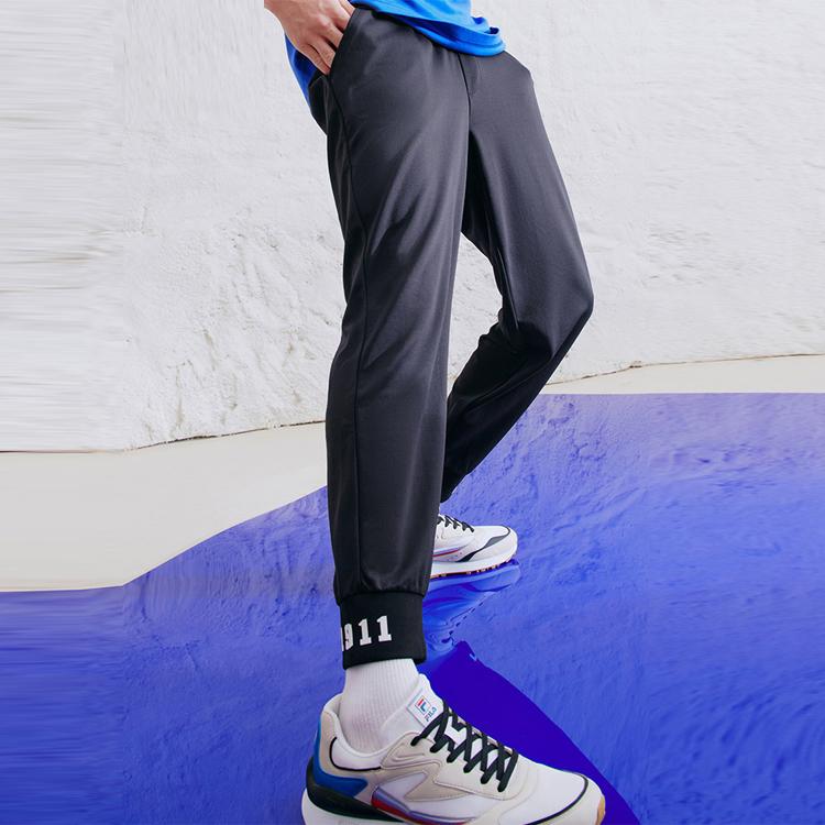 FILA Knitted Breathable Cuffed Sports Pants Men Bottoms Legendary-Blue F51M138619FNV